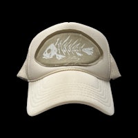 a beige hat with a fish skeleton on it